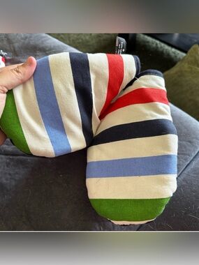 Kate Spade striped oven mitts featuring a vibrant multicolor pattern